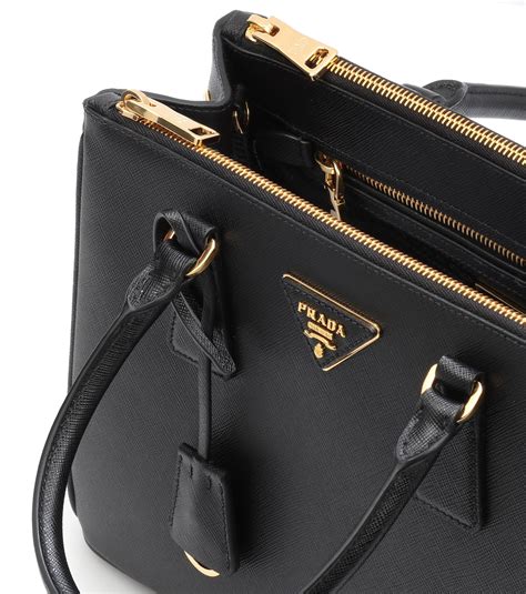 small black prada shoulder bag.